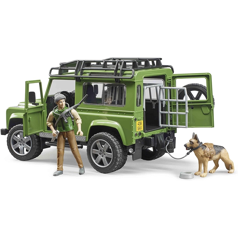 Defender Land Rover Station Wagon s figúrkou poľovníka a psa BRUDER 1